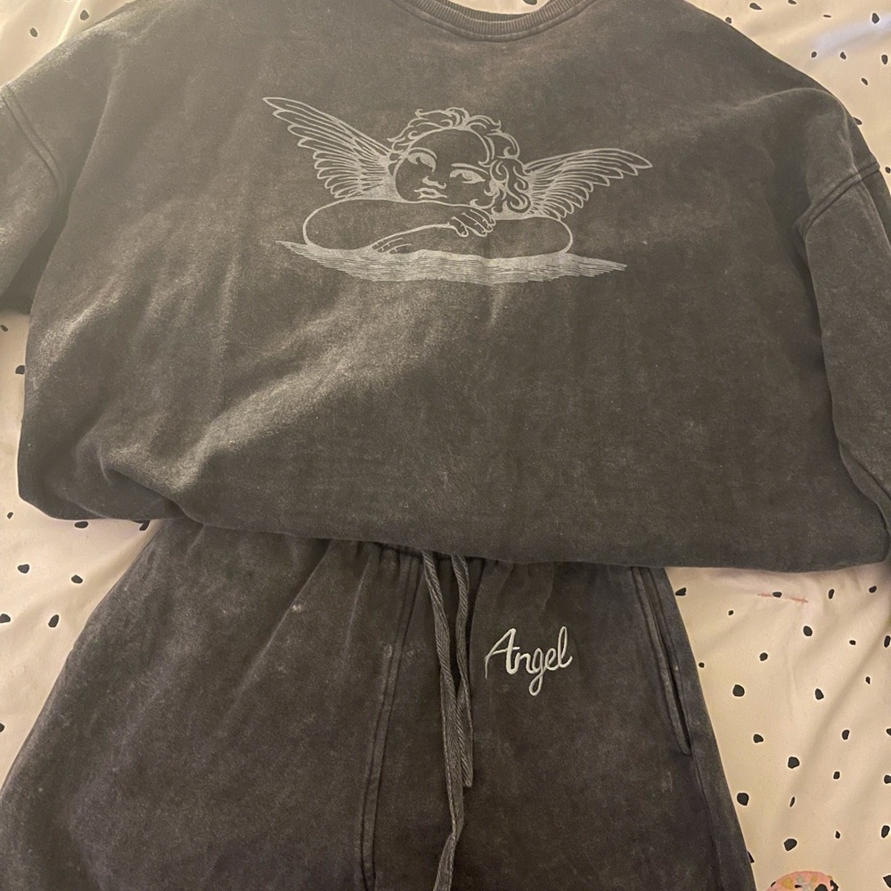 A gray motel rock sweatshirt and sweatpants